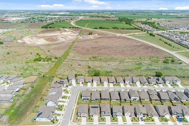 303 Blackbear Dr, Hutto, TX 78634 - aerial view of property and surrounding area with nearby suburban area