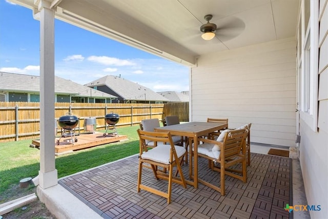 303 Blackbear Dr, Hutto, TX 78634 - view of patio featuring outdoor dining area, ceiling fan, a deck, and grilling area
