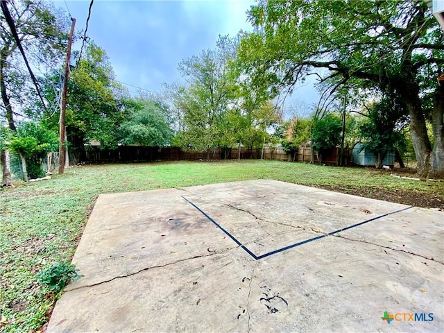 view of patio / terrace with basketball hoop