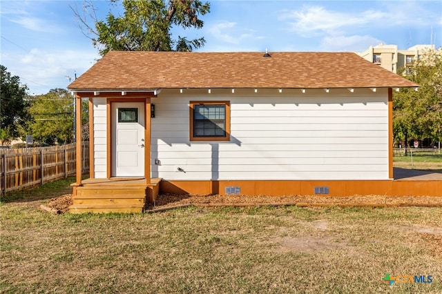 exterior space featuring a yard