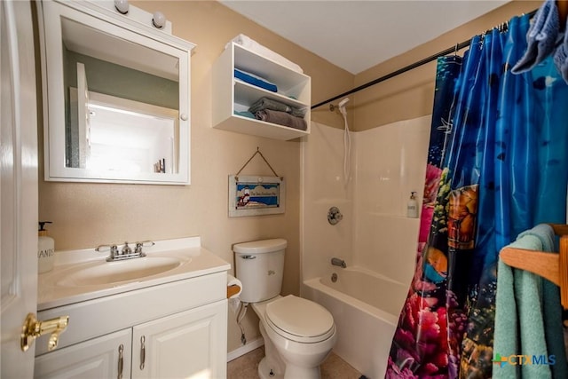 full bathroom with vanity, shower / tub combo with curtain, and toilet