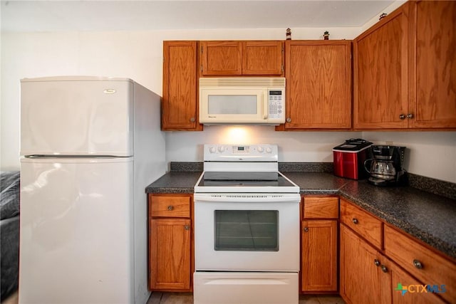 kitchen featuring white appliances