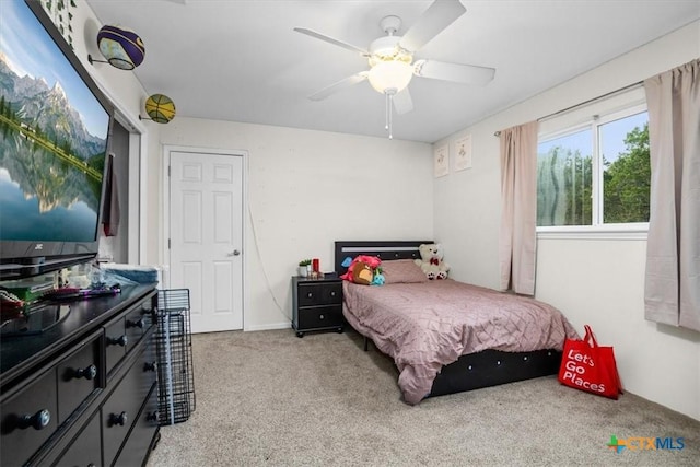 bedroom featuring carpet floors and a ceiling fan