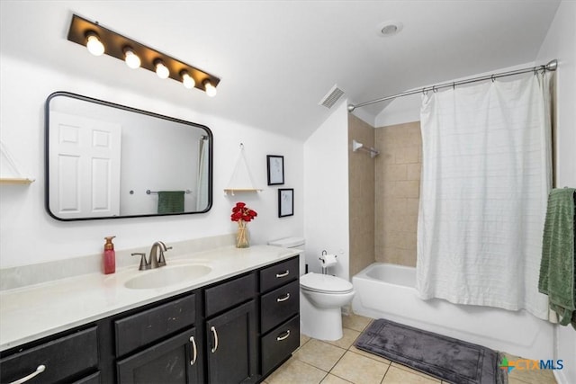 bathroom featuring shower / tub combo with curtain, visible vents, toilet, vanity, and tile patterned flooring