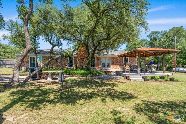 205 Timberline Rd, Temple, TX 76502 - view of yard with a gazebo, french doors, and a wooden deck