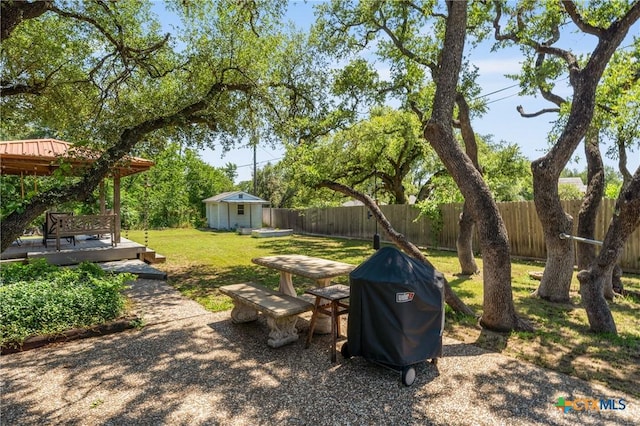 205 Timberline Rd, Temple, TX 76502 - view of yard with an outdoor structure and a wooden deck