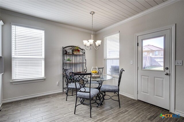 2844 Klein Way, New Braunfels, TX 78130 - dining room with ornamental molding, a chandelier, wood finished floors, baseboards, and wood ceiling
