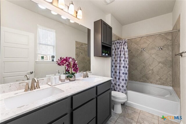 14902 Ardilla, San Antonio, TX 78217 - bathroom with toilet, shower / bath combo, double vanity, and tile patterned flooring