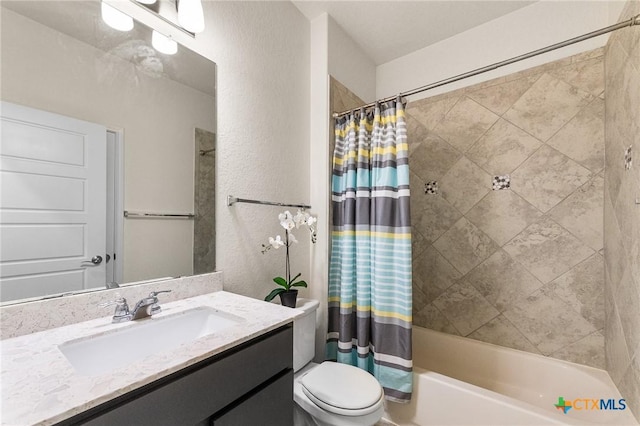 14902 Ardilla, San Antonio, TX 78217 - full bathroom with shower / tub combo, toilet, vanity, and a textured wall