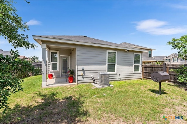 14902 Ardilla, San Antonio, TX 78217 - back of house featuring central air condition unit and a patio