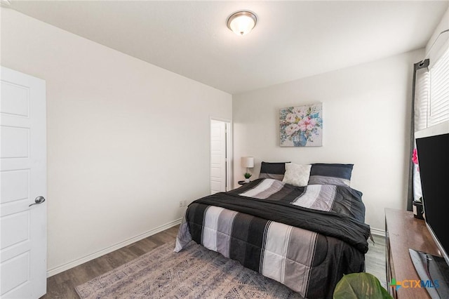 14902 Ardilla, San Antonio, TX 78217 - bedroom featuring wood finished floors and baseboards