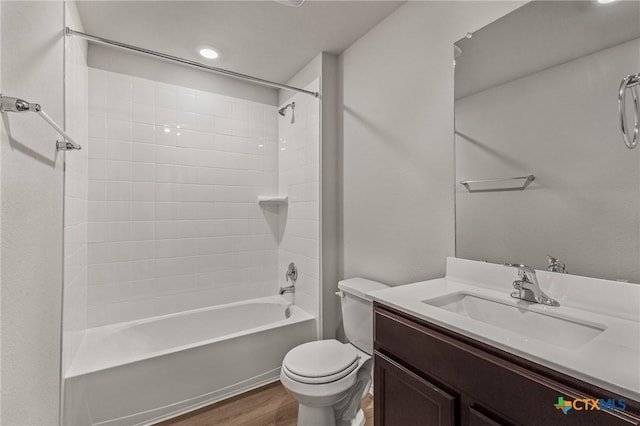 702 Stonevalley Rd, Temple, TX 76502 - full bathroom with vanity, wood finished floors, and tub / shower combination