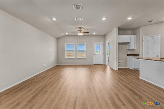 702 Stonevalley Rd, Temple, TX 76502 - unfurnished living room with a ceiling fan, light wood-style flooring, recessed lighting, and vaulted ceiling