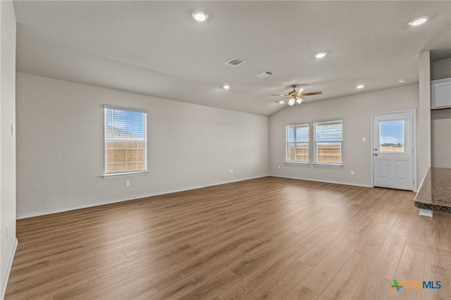 702 Stonevalley Rd, Temple, TX 76502 - unfurnished room with light wood-style floors, ceiling fan, recessed lighting, and lofted ceiling