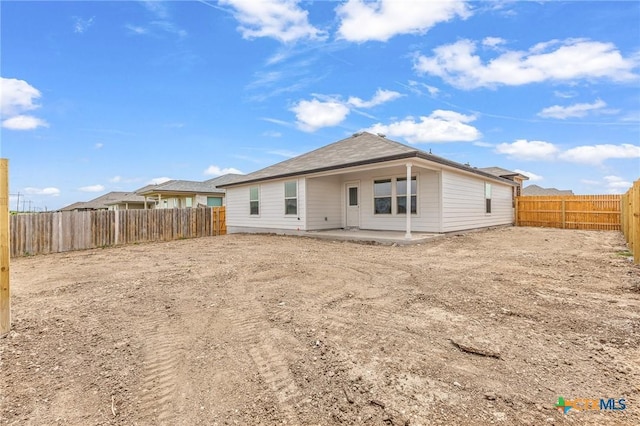 702 Stonevalley Rd, Temple, TX 76502 - rear view of house with a fenced backyard and a patio area