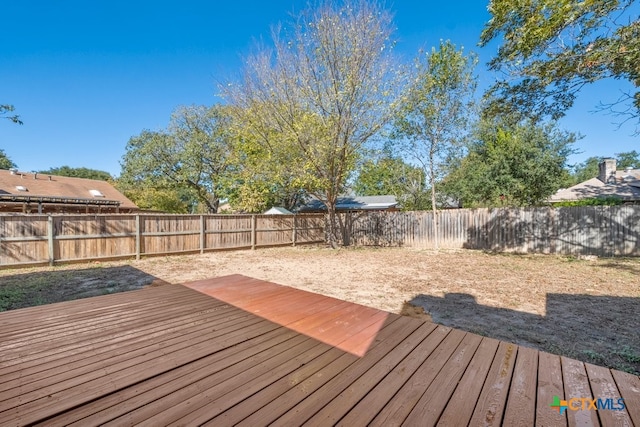309 Paisano St, New Braunfels, TX 78130 - wooden deck with a fenced backyard