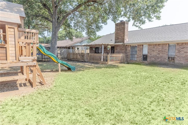 418 Taos Dr, Victoria, TX 77904 - view of yard featuring a playground