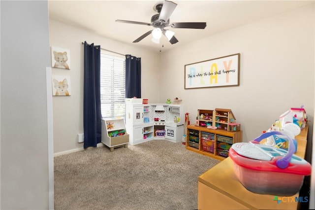 418 Taos Dr, Victoria, TX 77904 - playroom with carpet, a ceiling fan, and baseboards