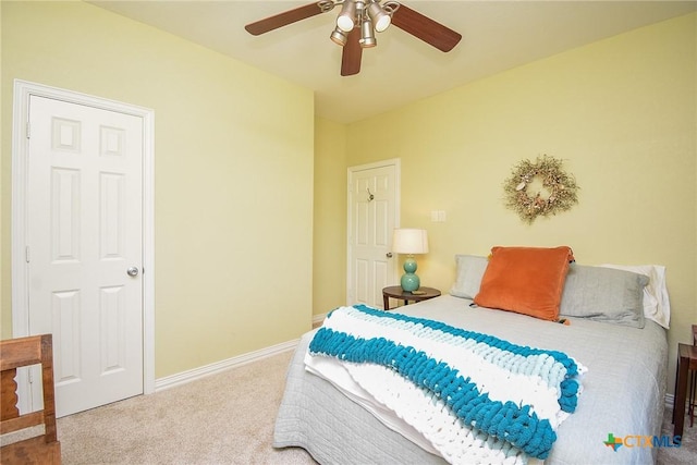 1588 W Bayshore Dr, Palacios, TX 77465 - carpeted bedroom featuring baseboards and a ceiling fan