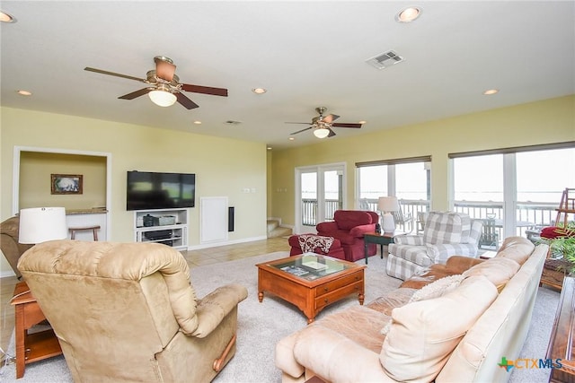 1588 W Bayshore Dr, Palacios, TX 77465 - living room featuring a ceiling fan, recessed lighting, baseboards, and light tile patterned floors
