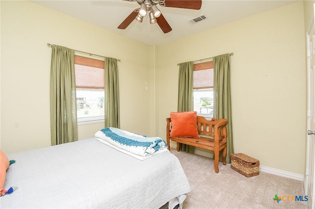 1588 W Bayshore Dr, Palacios, TX 77465 - carpeted bedroom featuring ceiling fan and baseboards