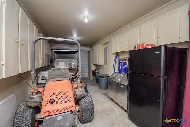 1588 W Bayshore Dr, Palacios, TX 77465 - garage featuring freestanding refrigerator and electric panel