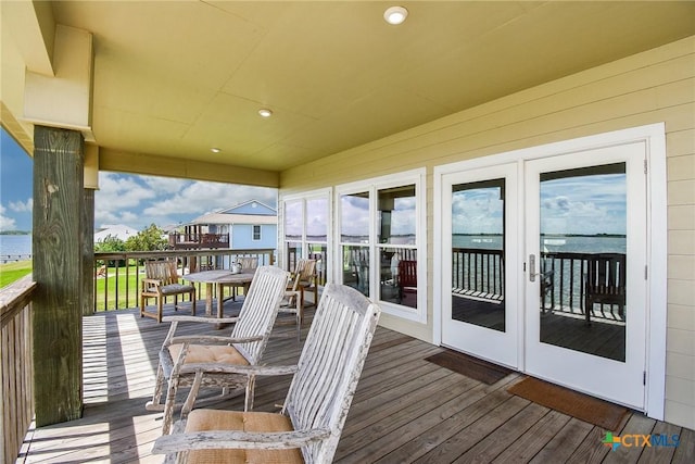 1588 W Bayshore Dr, Palacios, TX 77465 - deck featuring french doors