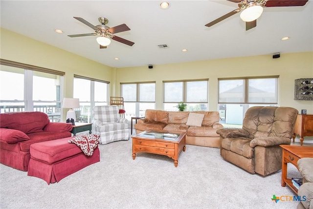1588 W Bayshore Dr, Palacios, TX 77465 - living room featuring a ceiling fan, carpet flooring, and recessed lighting