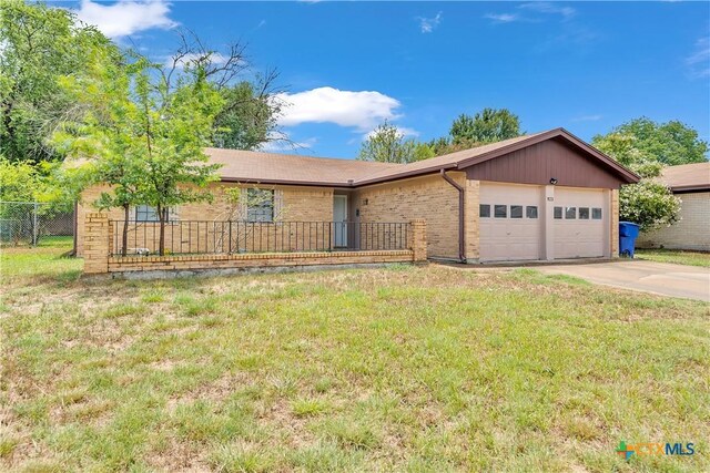 1123 Rhonda Lee St, Copperas Cove, TX 76522 - ranch-style home featuring a garage, driveway, and brick siding