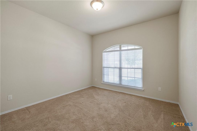 1313 Juneberry Park Dr, Temple, TX 76502 - carpeted empty room featuring baseboards