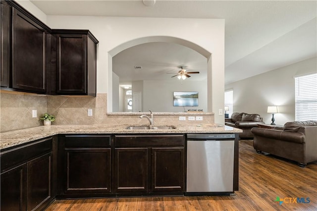 1313 Juneberry Park Dr, Temple, TX 76502 - kitchen with dishwasher, a ceiling fan, a sink, open floor plan, and light stone counters