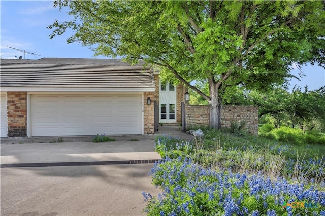 view of front of property featuring a garage