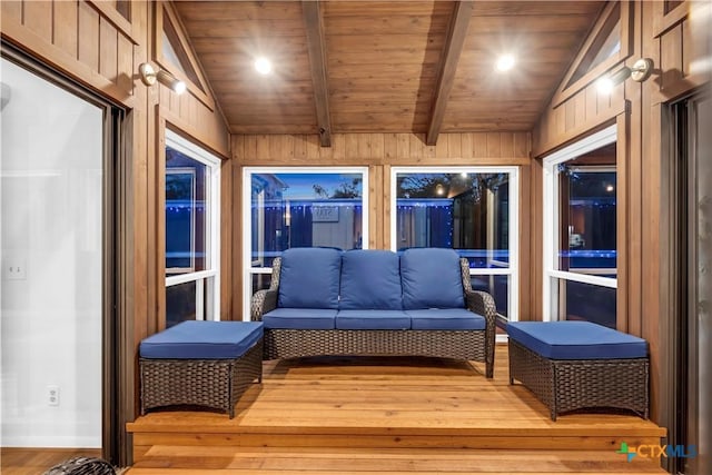 sunroom / solarium with lofted ceiling with beams and wood ceiling