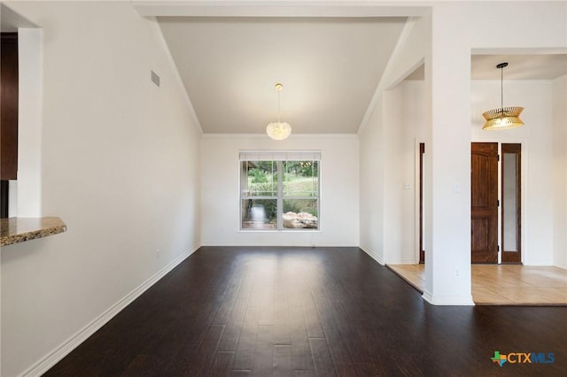 215 Maverick Cir, Horseshoe Bay, TX 78657 - unfurnished dining area with wood finished floors, ornamental molding, and high vaulted ceiling