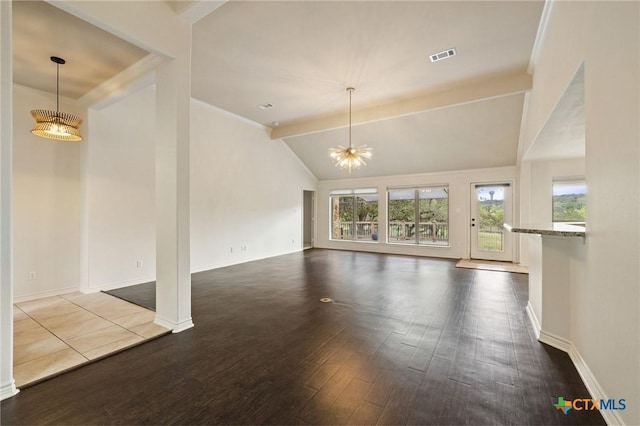 215 Maverick Cir, Horseshoe Bay, TX 78657 - unfurnished living room with plenty of natural light, dark wood-type flooring, and a chandelier