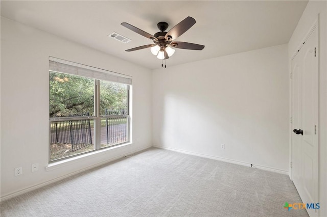 215 Maverick Cir, Horseshoe Bay, TX 78657 - unfurnished room featuring ceiling fan and carpet flooring