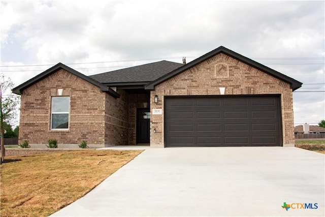 1806 Gigante Dr, Killeen, TX 76543 - single story home with brick siding, driveway, and an attached garage
