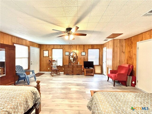 bedroom with hardwood / wood-style flooring and ceiling fan