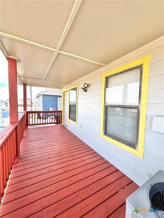 wooden deck featuring central AC