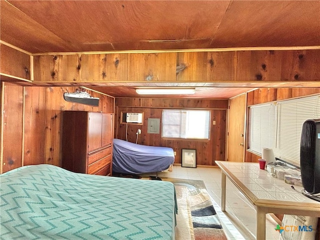 bedroom featuring wood ceiling, light tile patterned floors, a wall unit AC, and wood walls