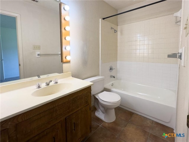 1804 Kingman Rd, Killeen, TX 76549 - bathroom with a textured wall, shower / washtub combination, vanity, and tile patterned flooring