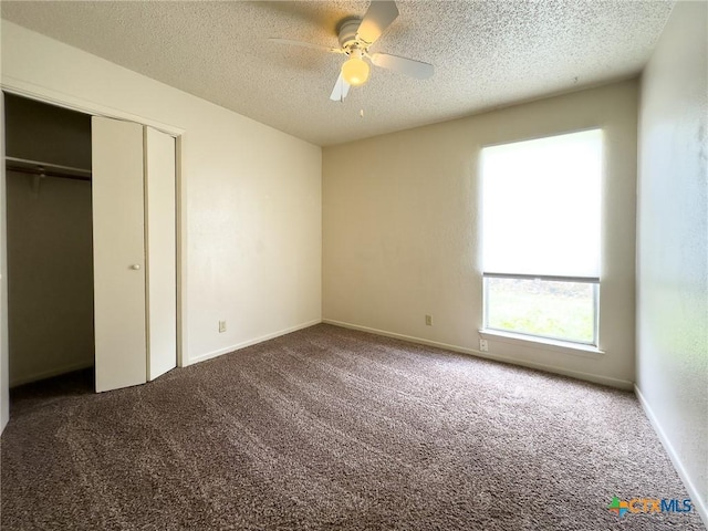 1804 Kingman Rd, Killeen, TX 76549 - unfurnished bedroom with carpet, a textured ceiling, a closet, and a ceiling fan