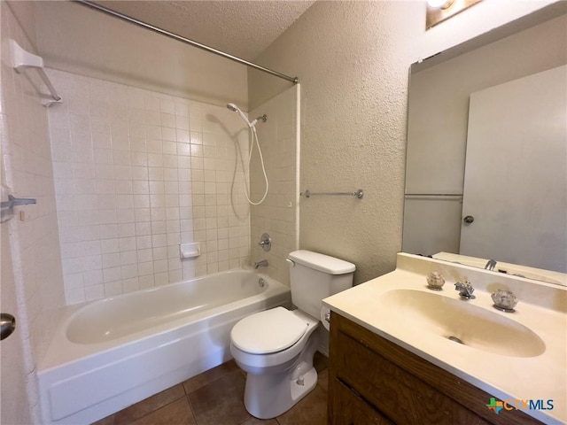 1804 Kingman Rd, Killeen, TX 76549 - bathroom with a textured wall, a textured ceiling, shower / tub combination, vanity, and tile patterned floors