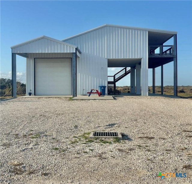 view of outbuilding with a garage