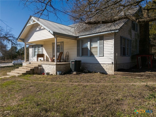 3041 Fm 1113, Copperas Cove, TX 76522 - exterior space with a front yard, covered porch, and central air condition unit