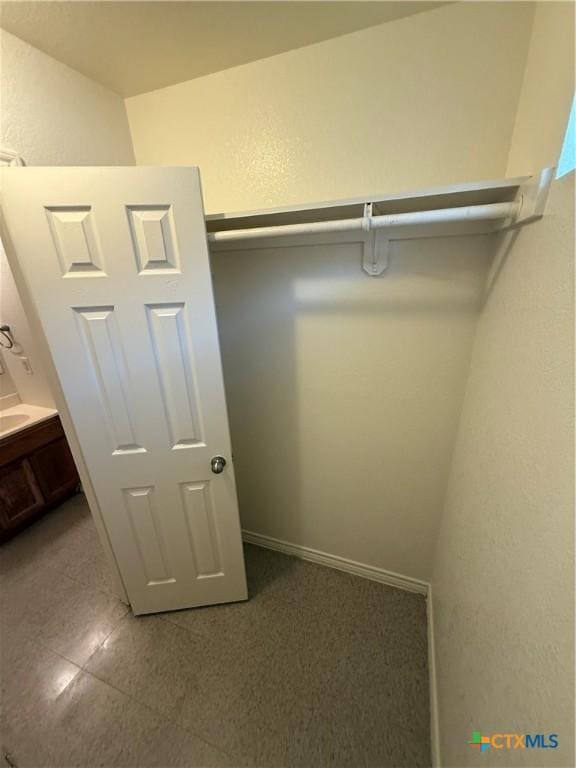 705 N 2nd St, Temple, TX 76501 - walk in closet featuring granite tiled floors