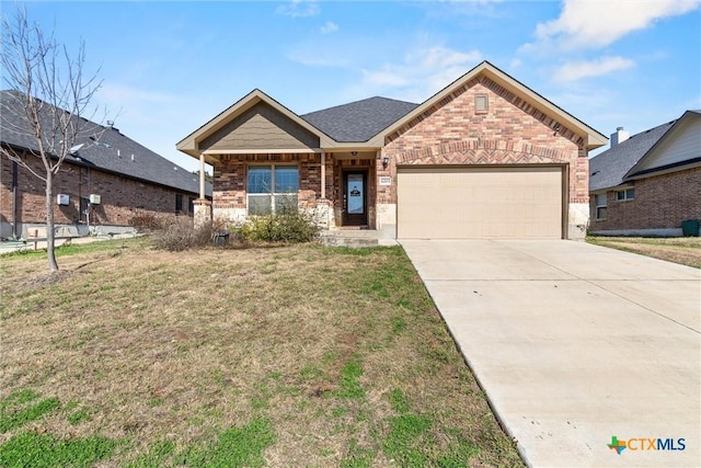 view of front of home with a garage, concrete driveway, roof with shingles, a front lawn, and brick siding