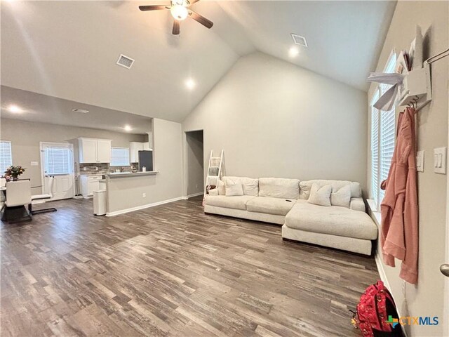 109 Opal Way, Port Lavaca, TX 77979 - living room with ceiling fan, dark wood-type flooring, baseboards, recessed lighting, and high vaulted ceiling