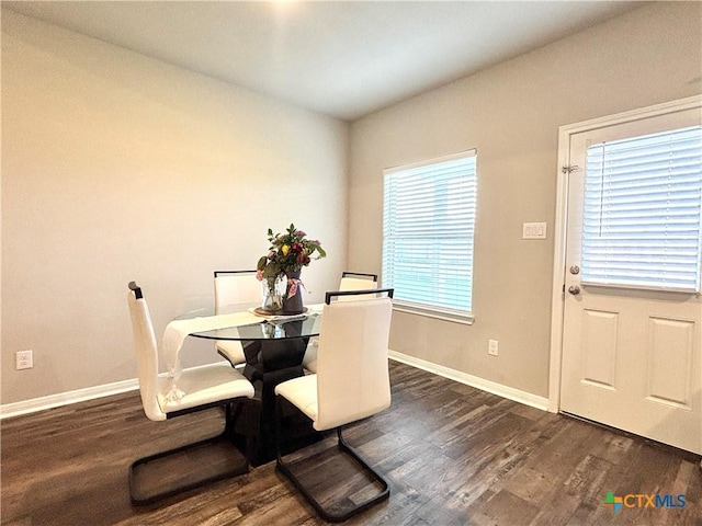 109 Opal Way, Port Lavaca, TX 77979 - dining space featuring dark wood-type flooring and baseboards
