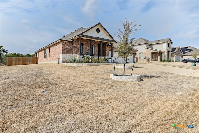 view of front facade featuring a porch and a garage